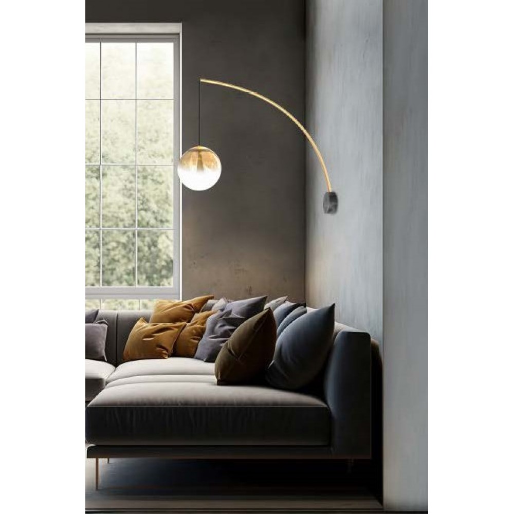 Wall lamp  with marble-look base and round glass for the finish.