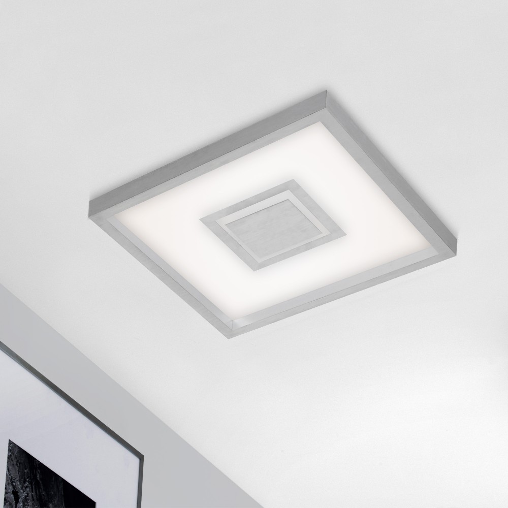 Square ceiling light with aluminium details . 