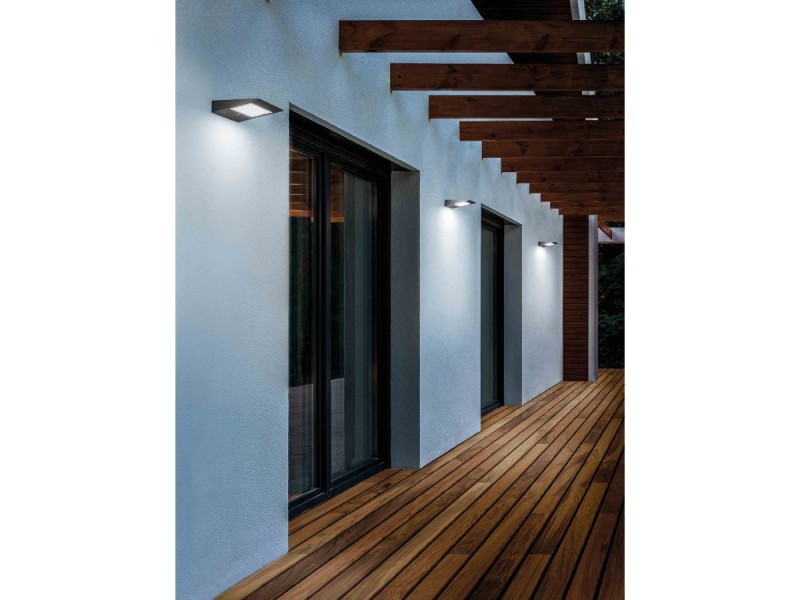 Wall lamp in dark grey painted die-casted aluminium,with a polycarbonate diffusor. The high IP rating (Ip54) makes the lampsideal for indoor and outdoor use. The lamps are fitted with a solar panel that autocharges the battery and a task sensor .This prod Wall lamp in dark grey painted die-casted aluminium,with a polycarbonate diffusor. The high IP rating (Ip54) makes the lampsideal for indoor and outdoor use. The lamps are fitted with a solar panel that autocharges the battery and a task sensor .This prod