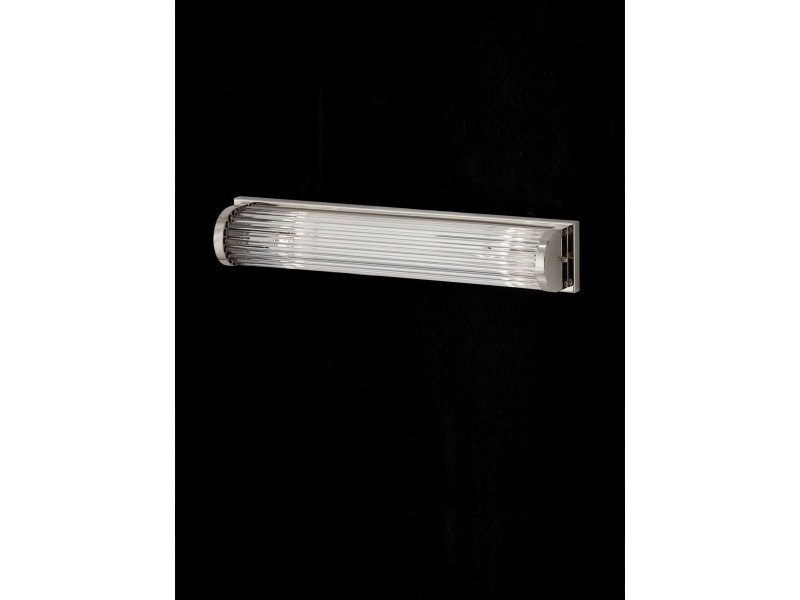 Wall light in chrome or gold finishing with glass bars. Wall light in chrome or gold finishing with glass bars.