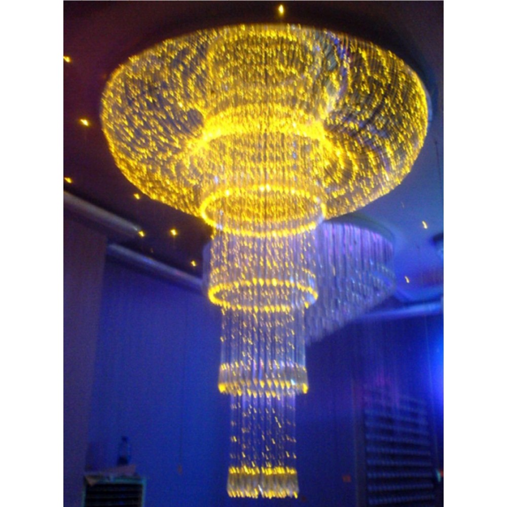Ceiling light with fiber optic and circular base.